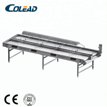 Lamp selecting conveyor belt for dates